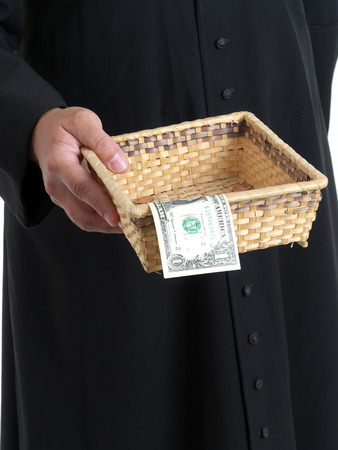 priest offering basket